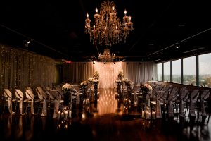 Blush and Gold themed Wedding Event Space with Chandeliers