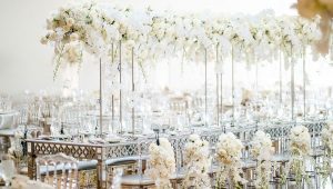 Staged wedding photo with elegant white flowers
